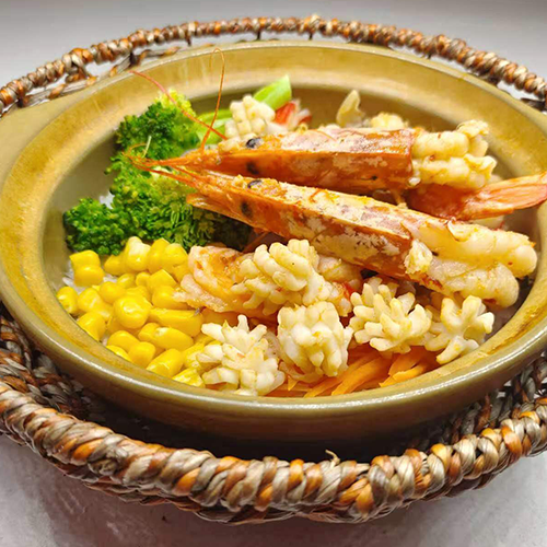 Riso in claypot con frutti di mare